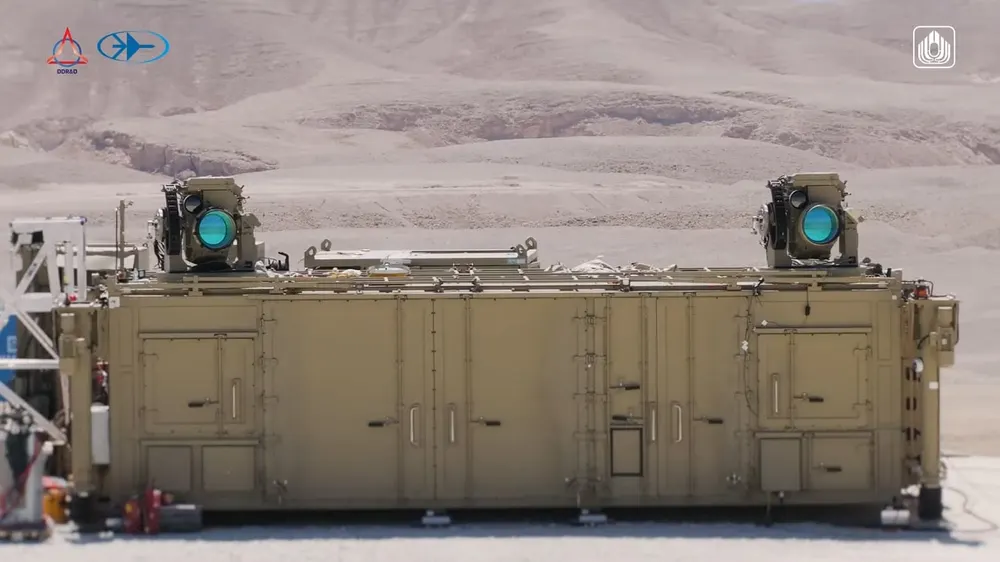 Israel's Iron Beam laser air-defence system: a tan container with two laser turrets on top, in a desert test area